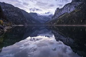 The Vordere Gosausee lake in the morning in autumn with a view of the Dachstein mountain range