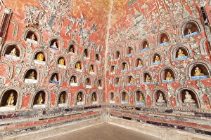 Category Buddhism Prints: Wall with small Buddhas and leaded glass figures