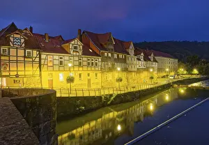 Wanfrieder Schlagd with half-timbered houses on the edge of the old town of Hannoversch Muenden in the evening