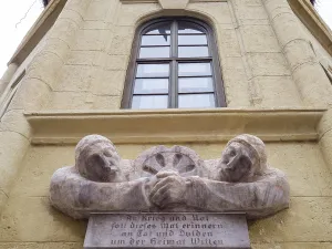 War memorial, detail, town hall tower