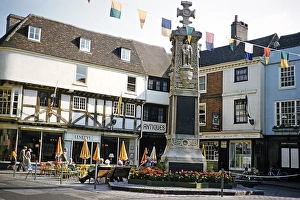 War memorial and shops in historic buildings, Buttermarket, Canterbury, Kent, England, United Kingdom, early 1960s, Europe