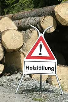 Warning sign, logging in progress