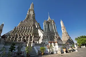 Wat Arun or Temple of Dawn over blue sky