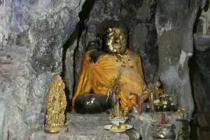 Wat Chakkrawat is famous for its live crocodiles and also a small grotto containing what is called a Buddha shadow