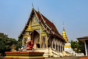 Wat Khu Kum, the ancient buddhist temple with the big Seated Buddha