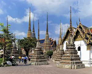 Wat Pho temple, chedis, tourists in the courtyard