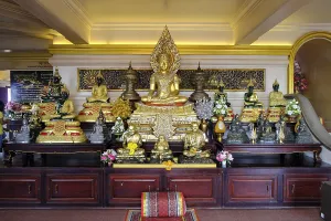 Wat Saket or Golden Mount, golden Buddha figures at the entrance