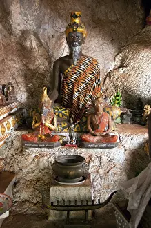 Wat Tham Seua, the Temple of the Tiger Cave is built into a cave set in a limestone cliff