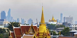 Category Buddhism Prints: Wat Tri Thotsathep Worawihan, behind it Golden Mount and the skyline of Bangkok