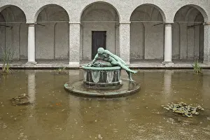 Water basin in the rain, the Narcissus Fountain by Hubert Netzer 1896 at the National Museum