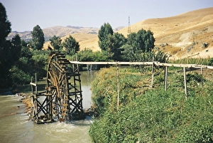 Water wheel supplying the irrigation canal with water from the river, west of Fez, Morocco, North Africa, 1971, Africa
