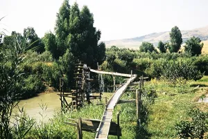 Water wheel supplying the irrigation canal with water from the river, west of Fez, Morocco, North Africa, 1971, Africa
