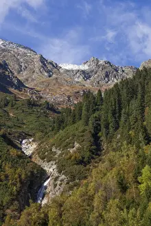 Framed Print : Waterfall, forest and mountains in Mutterberg Valley in autumn