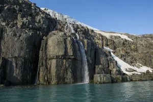 Waterfall in a glacier on Alkefjellet