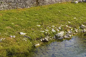 The waters of the stream Tramazzo while bathing the hill village of Tredozio in Romagna in the countryside in Northern