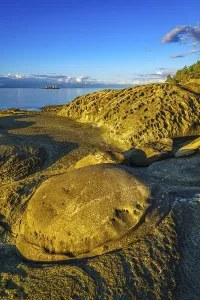 Weathered sandstone rock formations known as tafoni along the northeast shore of Gabriola Island