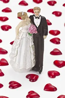 Wedding couple with hearts on a light background