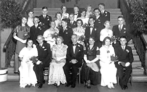 Ten wedding couples, historic photograph