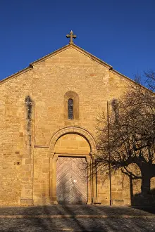 The west facade of the Romanesque church in the old bourg of Iguerande