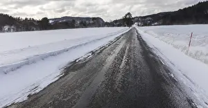 Wet and slippery, a small road in Norway