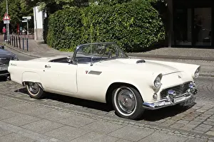 White American Vintage Ford Thunderbird Convertible Standing on the Road