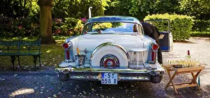 Framed Print : White Cadillac with champaign glasses