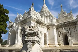 White Pagoda at Inwa ancient city with lions guardian statues