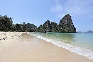 White sand on a beach and rocks