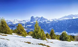 White snowy Dolomites mountains with rocks