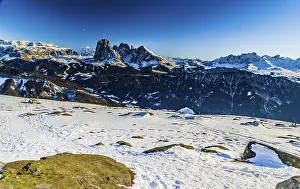 White snowy Dolomites mountains with rocks