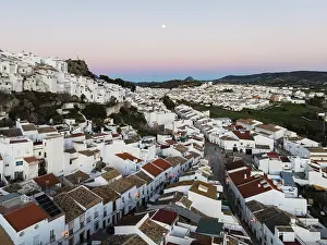 The White Town of Olvera with full moon at dusk