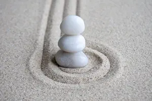 White Zen stones on circles formation with customizable space for text