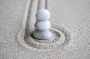 White Zen stones on circles formation with customizable space for text