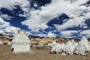 Whitewashed chortens (Tibetan Buddhist stupas)