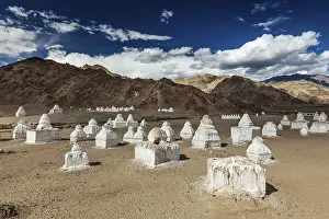 Whitewashed chortens (Tibetan Buddhist stupas)