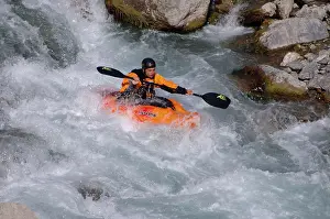 Whitewater kayaking on river near Chateau Queyras
