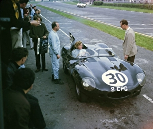 Whitsun Sports Car Race 3 June 1963, Pat Coundley in car, John Coundley standing, Jaguar D Type, Goodwood, England, UK