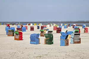 Wicker beach chairs on the beach