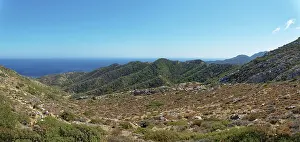 Framed Print : Wide landscape on the hiking trail from Avlona to Diafani with mountains stretching to the sea