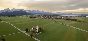 Wide landscape with mountains on the horizon in the evening light