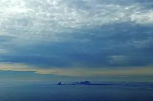 Category Scandinavia Prints: Wide open sky with dark clouds and islands Rost Lofoten Norway