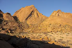 Wide view of impressive rocky mountains under a cloudless sky in Spitzkoppe