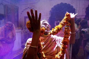 Widows dancing celebrating Holi festival