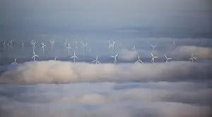 Wind power plants surrounded by clouds