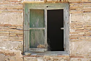 Window in an old ruin at the lighthouse of Conil de la Frontera/Spain