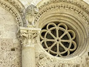 Windows, rose window, figures and reliefs