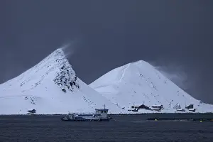 Windswept snow-capped mountains on the island of Mageroya