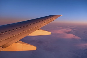 Category Scandinavia Prints: Wing of a plane, flight over clouds