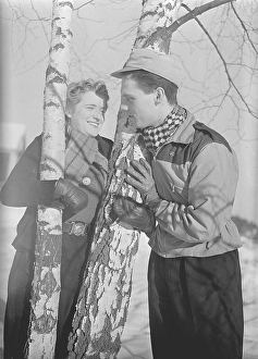 Winter in the 1940s. A young couple is enjoying their winter vacation