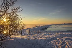 Winter landscape with snow, frozen ocean